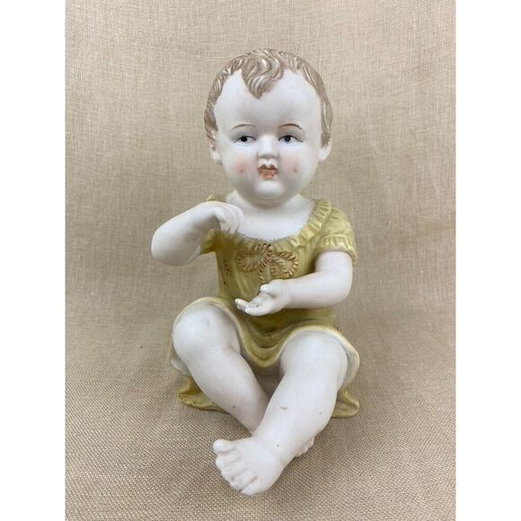 Vintage Bisque Porcelain Piano Baby Figurine 7”